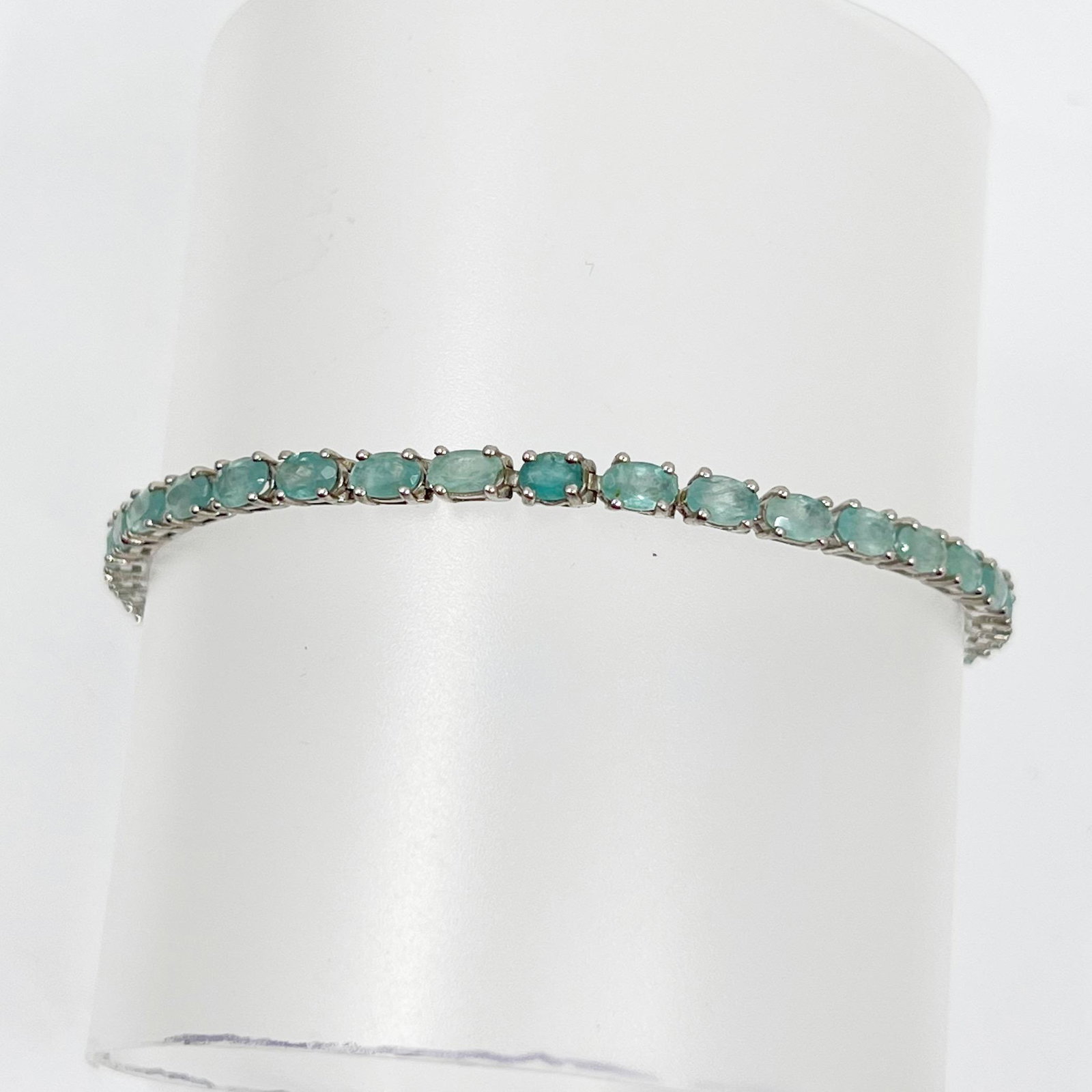 sterling silver blue topaz tennis bracelet: Measures: 7 1/2" long by 4mm wide Crafted with 5x3mm blue topaz Hallmark: 925 Condition: like new SKU-22