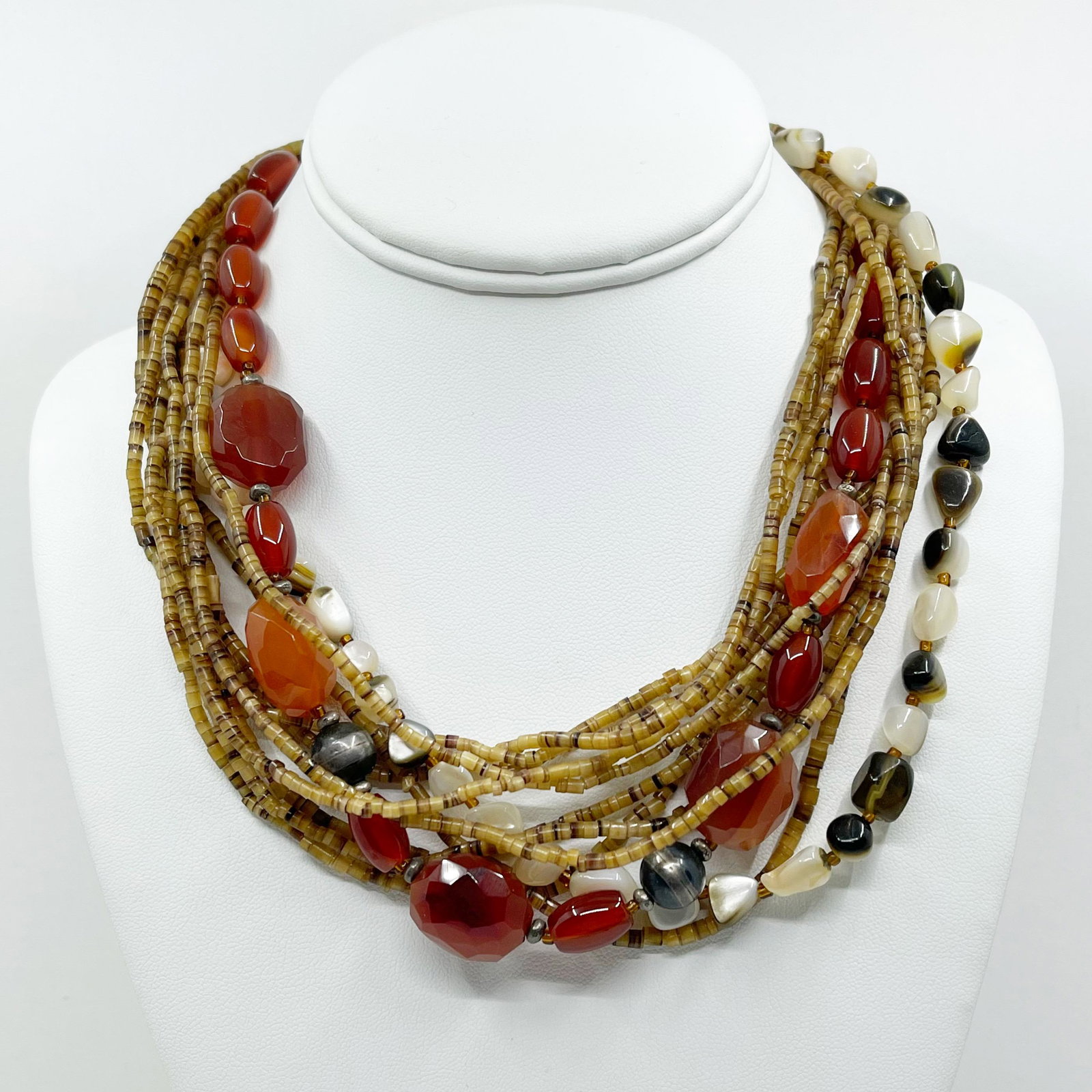 PEYOTE BIRD sterling silver carnelian necklace: Measures: 19 1/2" Long including the 2" long chain extender Gemstones: carnelian, Heishi, mother pearl & smoky quartz beads Material: sterling silver Signed: 925