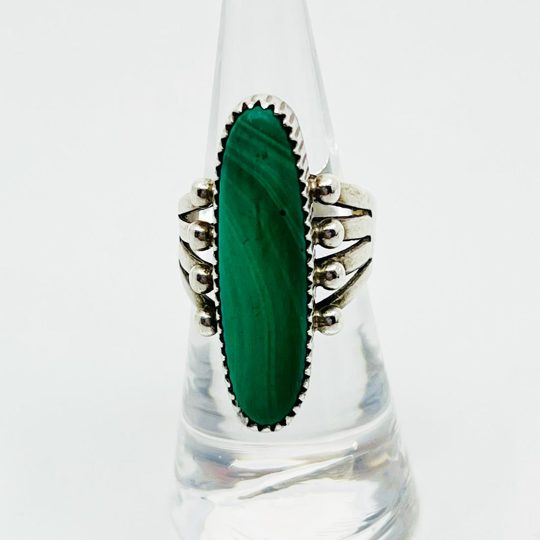 DTR Sterling silver malachite ring: Measurements: 1 1/4” Wide Size: 6 Crafted with 30x8mm malachite Condition: Good SKU-