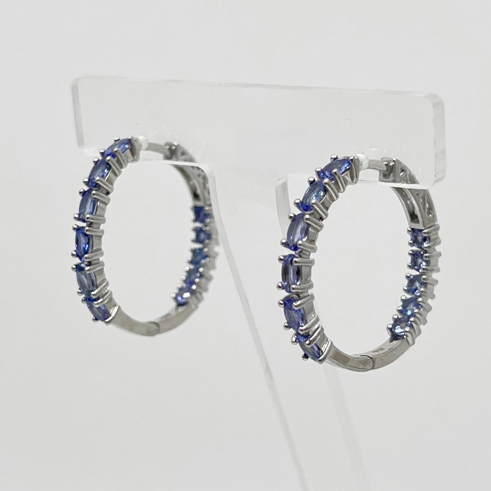 sterling silver iolite hoop earrings: Measurements: 1 1/8" long by 4mm wide Gemstones: 5x3mm iolite Material: sterling silver Signed: 925 D'Joy Condition: Like New SKU-184