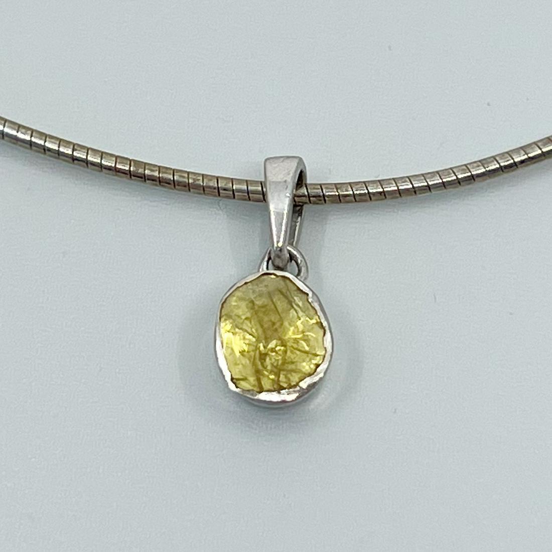 Sterling silver 8x6mm Polki yellow diamond pendant: Measures: 3/4" long by 3/8" wide Gemstone: 8x6mm sapphire & polki yellow diamond Condition: like new SKU-378