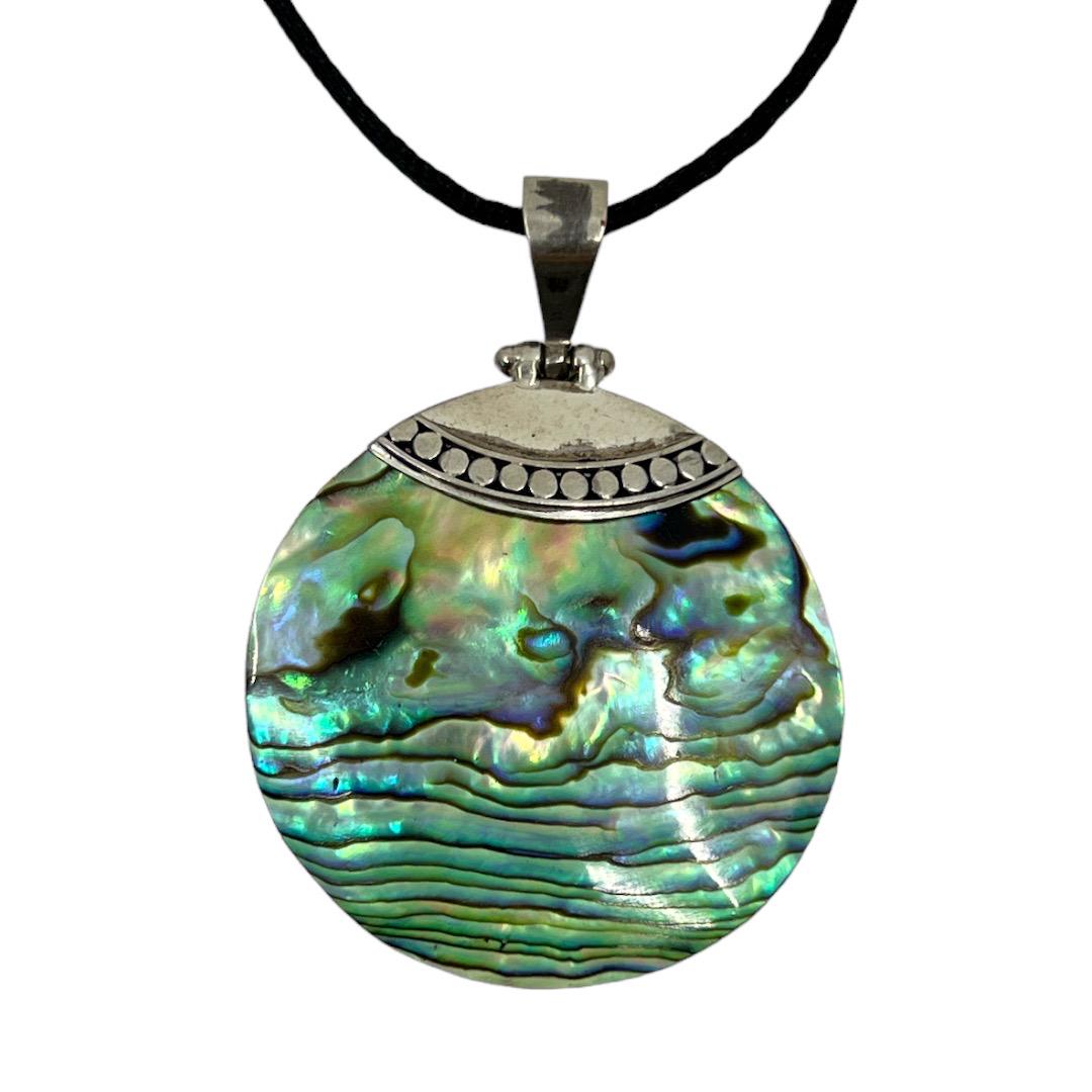 Sterling silver abalone pendant: Measures: 2 1/8" long by 1 5/8" wide Gemstone: 40mm abalone Condition: like new SKU-662