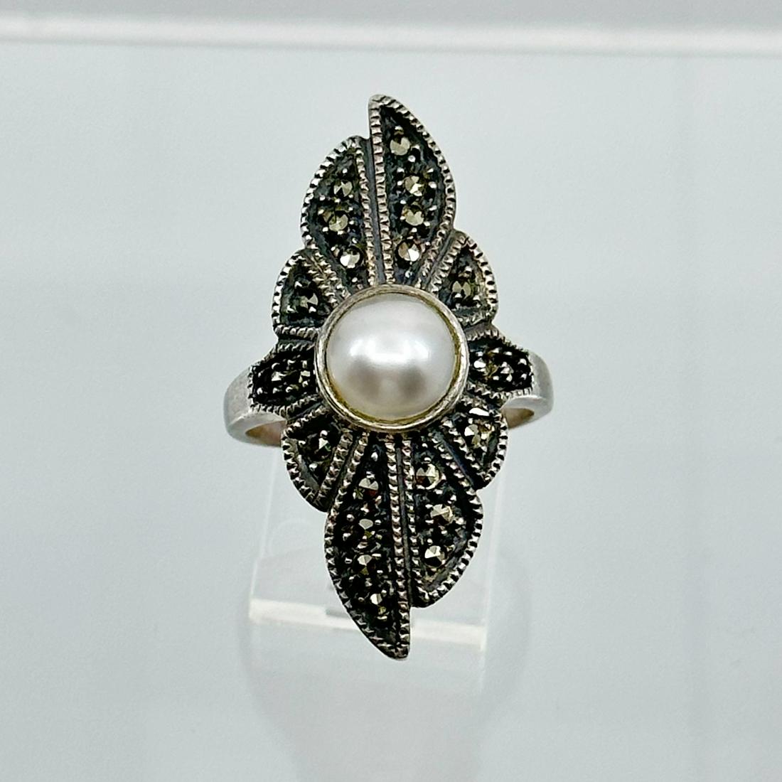 Judith Jack Sterling silver pearl & marcasite ring: Measures: 1 3/8" wide Size: 9 Gemstone: 8mm faux pearl & marcasite Condition: Like new SKU-1268