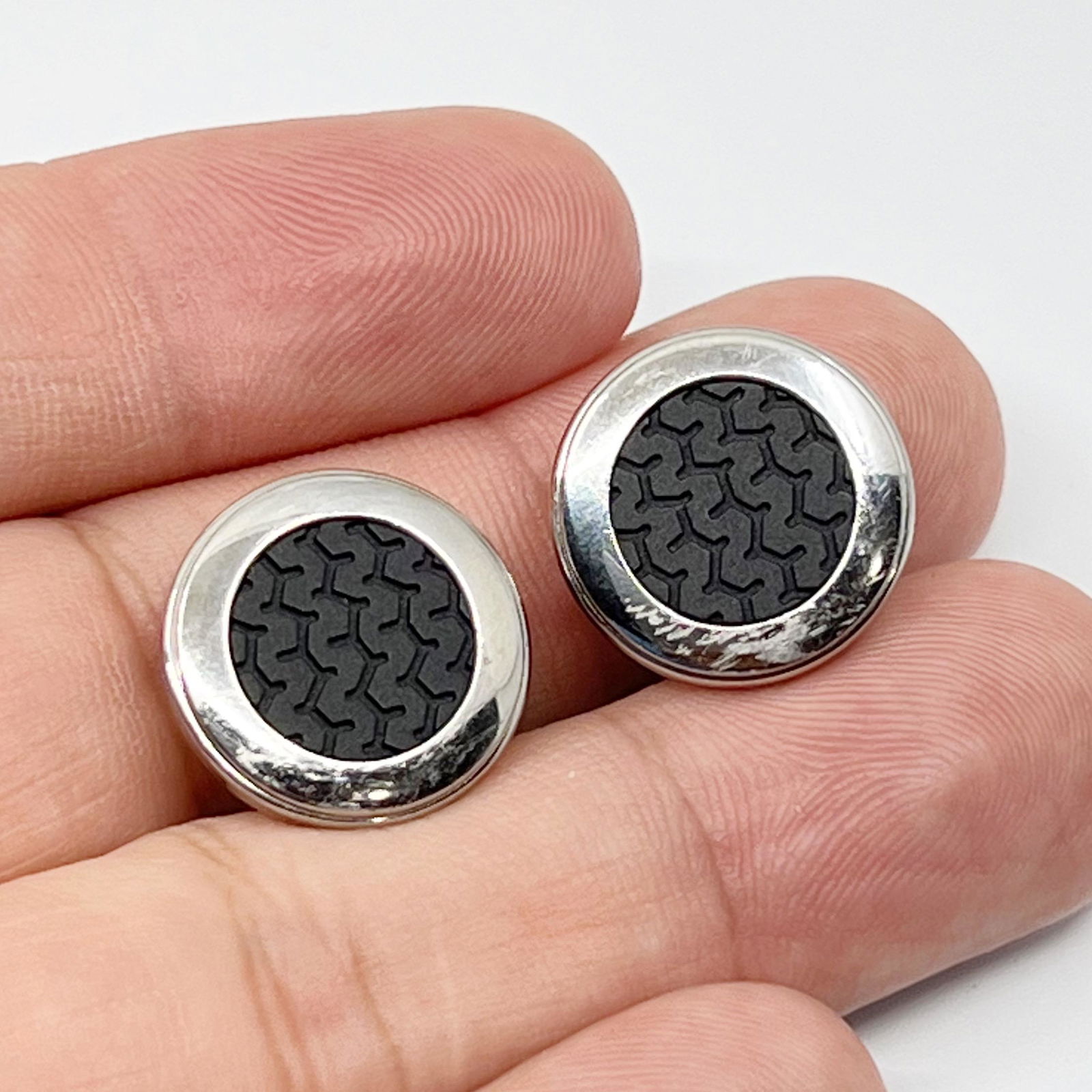 CHOPARD stainless steel black rubber mille miglia cufflinks: Measures: 3/4" wide Hallmark: Chopard 6107495 75/8331 In good pre-owned condition Note: they need to be re-polished SKU-1339