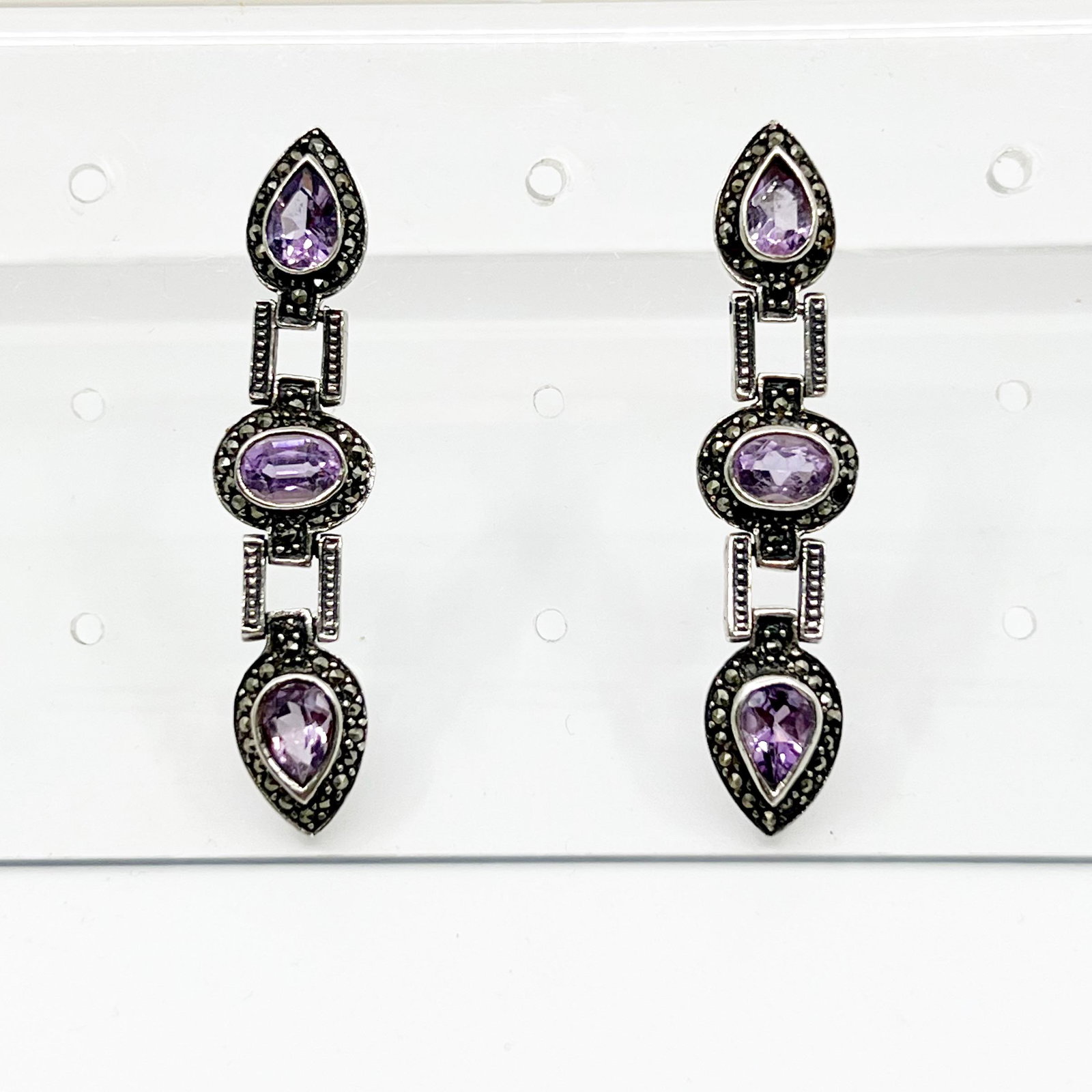 sterling silver amethyst & marcasite drop earrings: Measures: 2" long by 1/2" wide Crafted with amethyst & marcasites Condition: like new SKU-1361