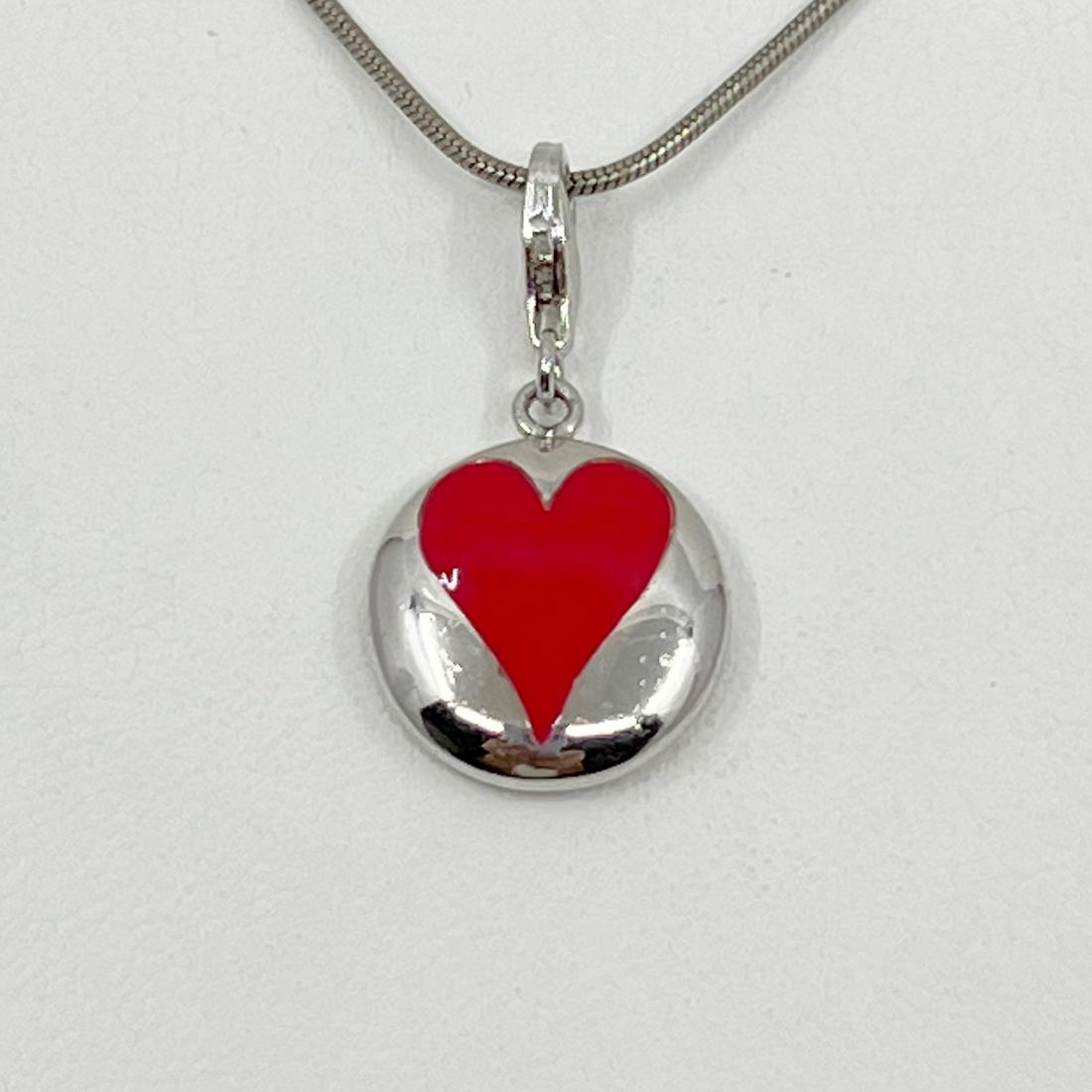 Sterling silver enamel heart charm pendant: Measures: 1 1/4" long by 5/8" wide Hallmark: 925 Condition: new SKU-1516