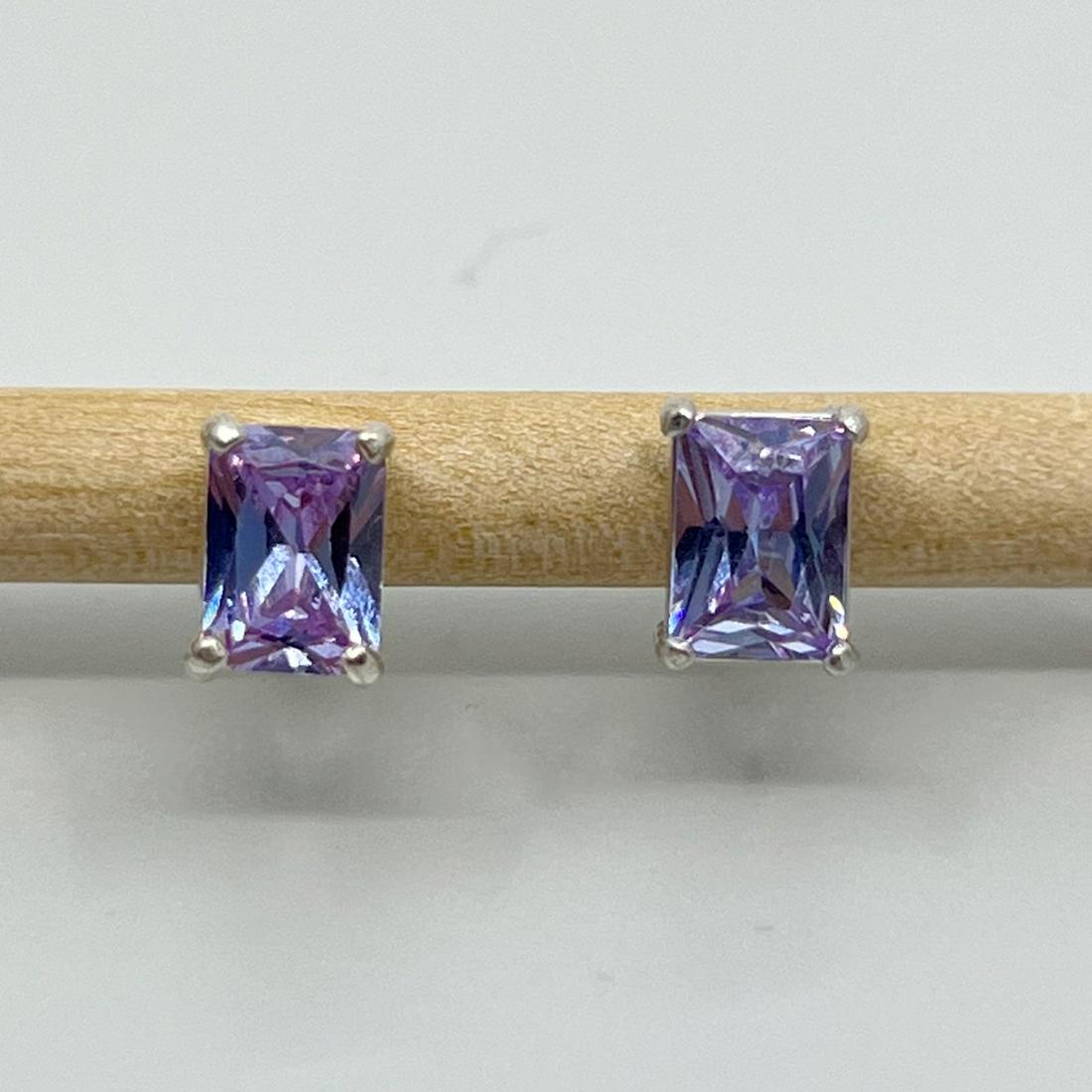 Sterling silver lilac cubic zirconia stud earrings: Measures: 8mm long by 6mm wide Gemstone: cubic zirconia Hallmark: 925 Condition: Like New SKU-258