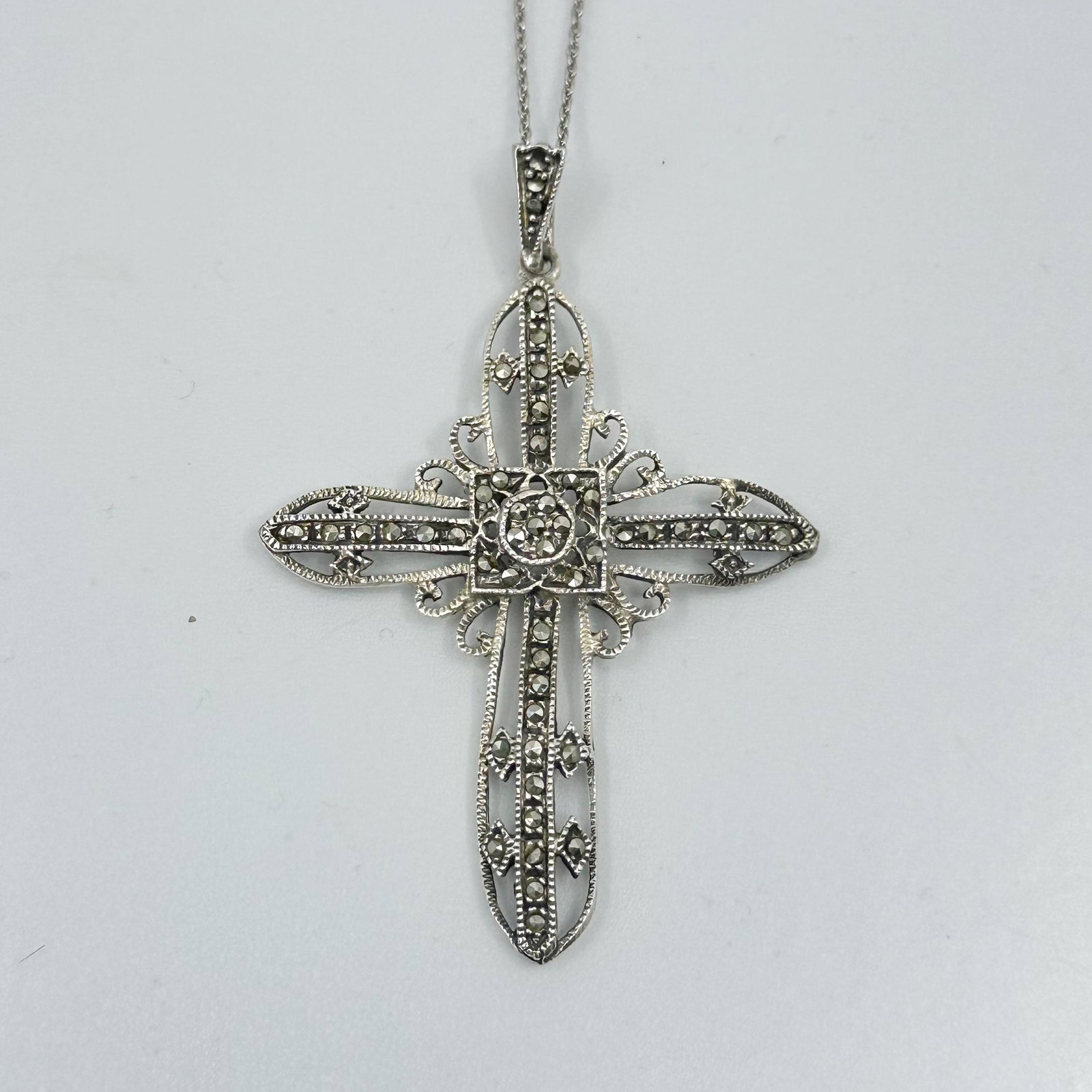 Sterling silver marcasite cross pendant: Measures: 2 3/8" Long by 1 5/8" Wide Crafted with marcasite Condition: Like New SKU-1136