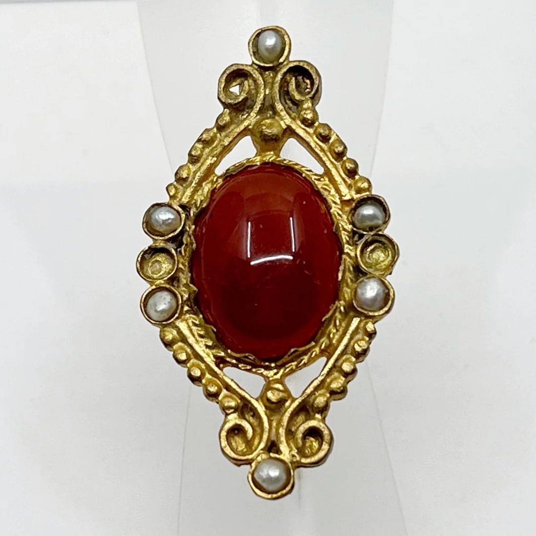 Vintage Gold Filled carnelian & seed pearl Ring: Measurements: 1 7/8” wide Gemstone: 20x15mm carnelian & 3mm seed pearl Size: 7 Condition: like new SKU-1688