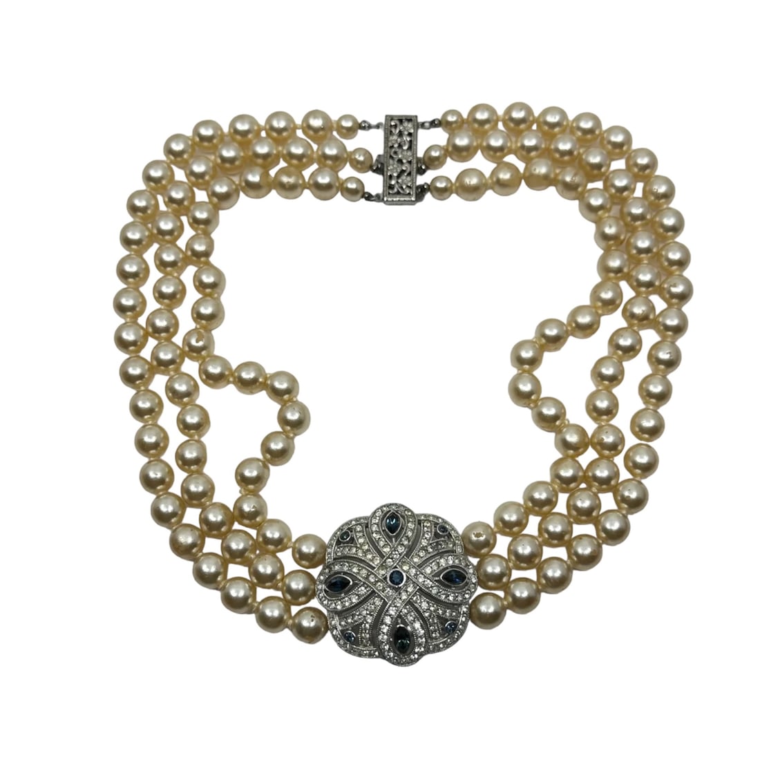 Sterling silver Rhinestones & Pearl choker necklace: Measures: 15" long by 1 3/8" wide Crafted with 8mm faux pearl & rhinestones Weights: 92.1 grams Hallmark: 925 In good condition Note: few pearls have some wear on it & missing one rhinestone S