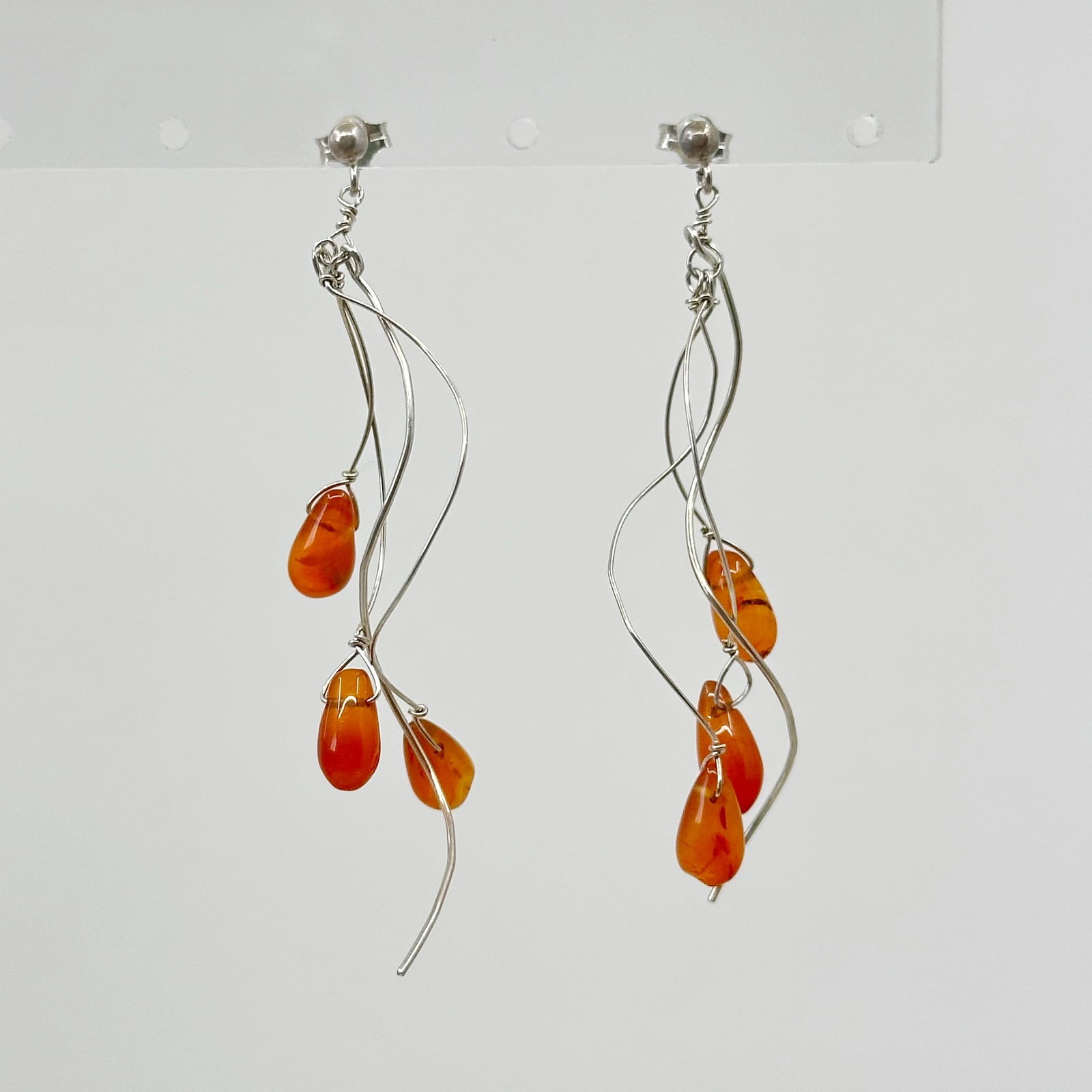 Sterling silver carnelian bead earrings: Measurements: 2 1/2" long Gemstone: carnelian bead Material: sterling silver condition: Like new SKU-951