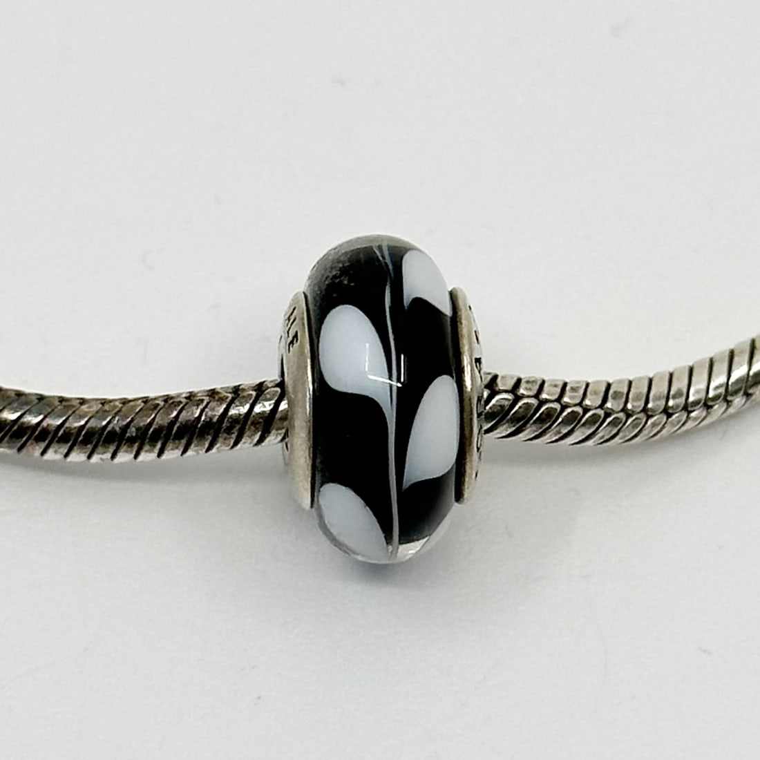 PANDORA sterling silver Murano Glass bead bead Charm: Measures: 15mm long by 9mm wide hallmark: Pandora 925 ale In very good condition SKU-1159