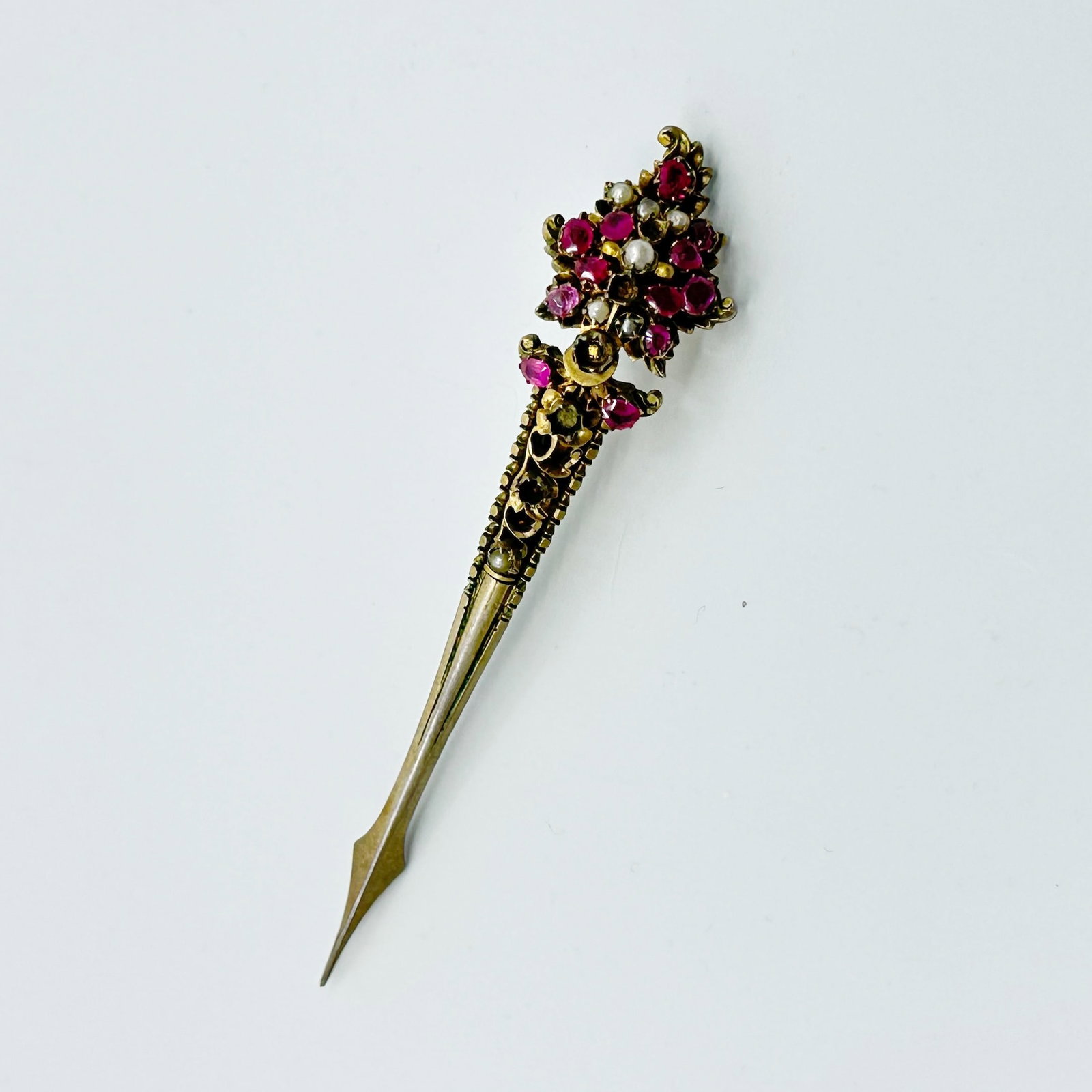 18th Century gilt sterling silver ruby & pearl Kondakoora Brooch: Measures: 3 3/4" long by 3/4" wide crafted with 2mm to 2.5mm seed natural pearl & 2mm to 3mm Burma ruby In good condition with 5 missing pearls SKU-1218