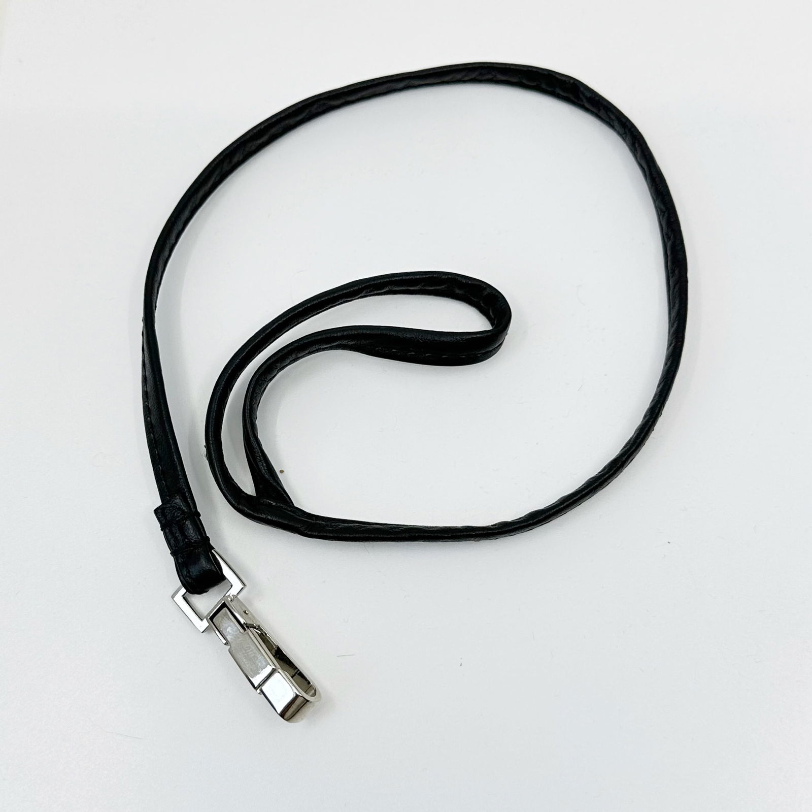 Chanel leather key chain holder: Measures: 22" long by 1/4" wide In excellent condition SKU-1533