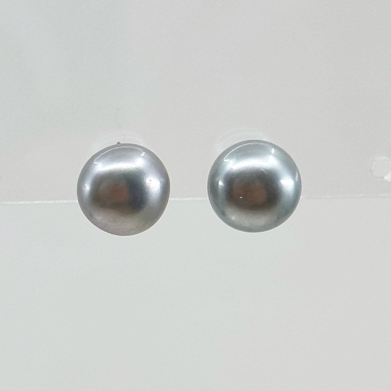 Honora sterling silver 9mm gray freshwater pearl stud earrings SKU-17: Measures: 9mm long Crafted with 9mm gray freshwater pearl Hallmark: 925 Weights: 1.8 grams In very good condition SKU-17