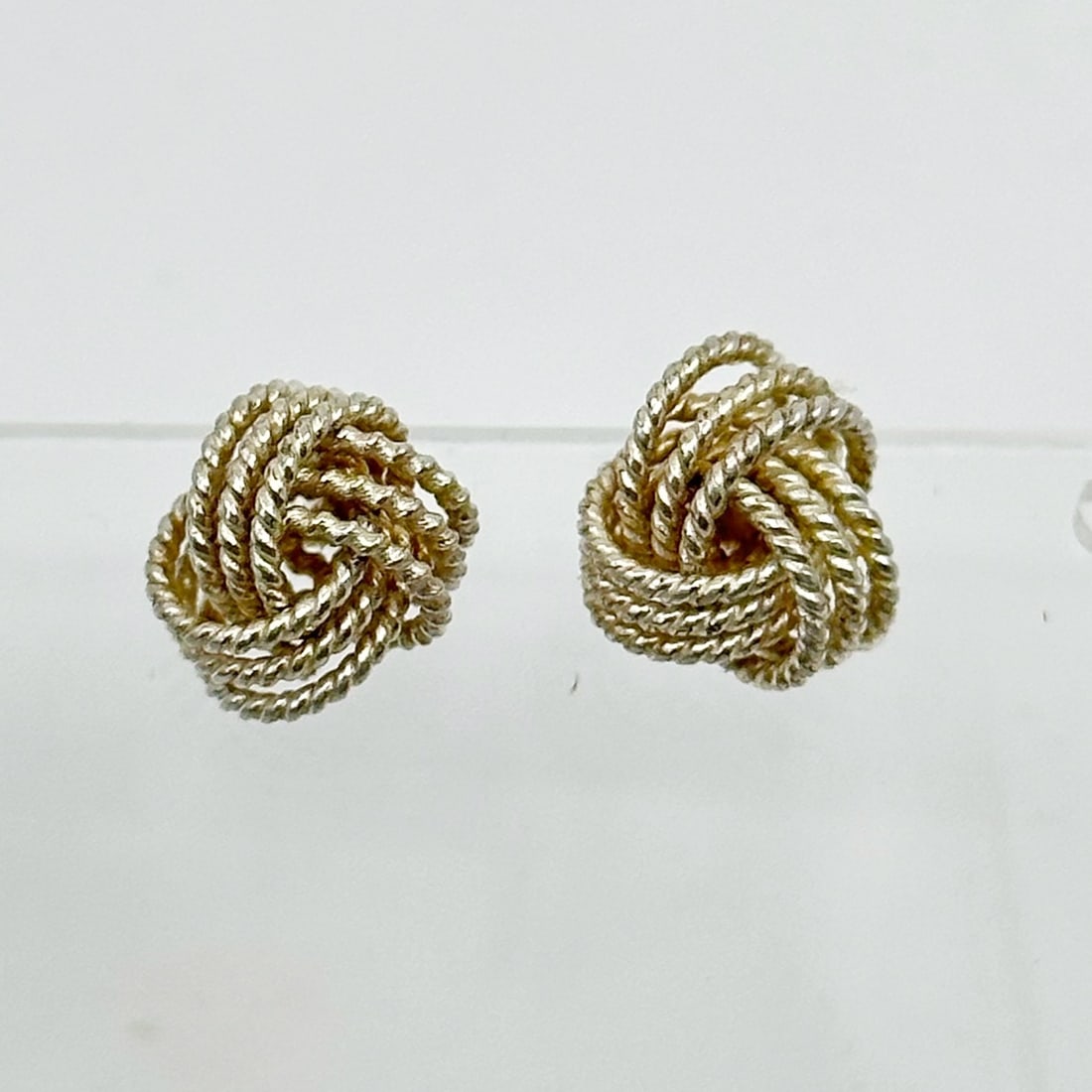 Sterling silver knot stud earrings SKU-74: Measures: 11mm long Material: sterling silver in very good condition SKU-74