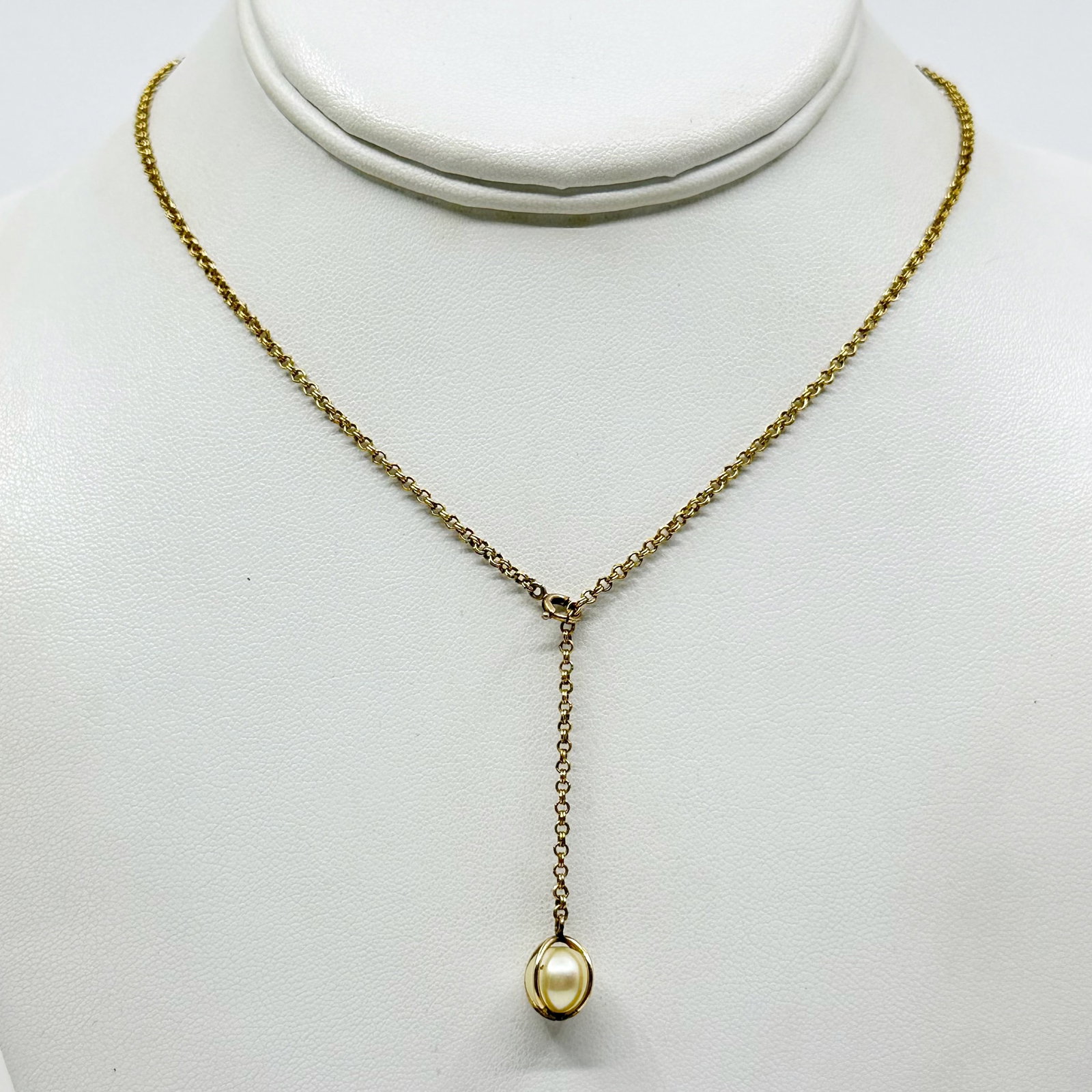Hand Made Gold Filled Akoya pearl lariat necklace SKU-522: Measurements: 22” long Pendant: 1/2" long crafted with 8mm Akoya pearl Material: gold filled In very good condition SKU-522
