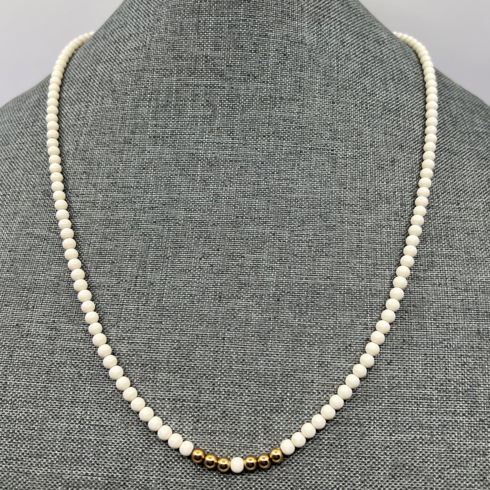 Monet Ivory & Gold Tone Bead Necklace SKU-689: Measures: 27 1/2” long Crafted with 5mm ivory & gold tone beads Condition: like new