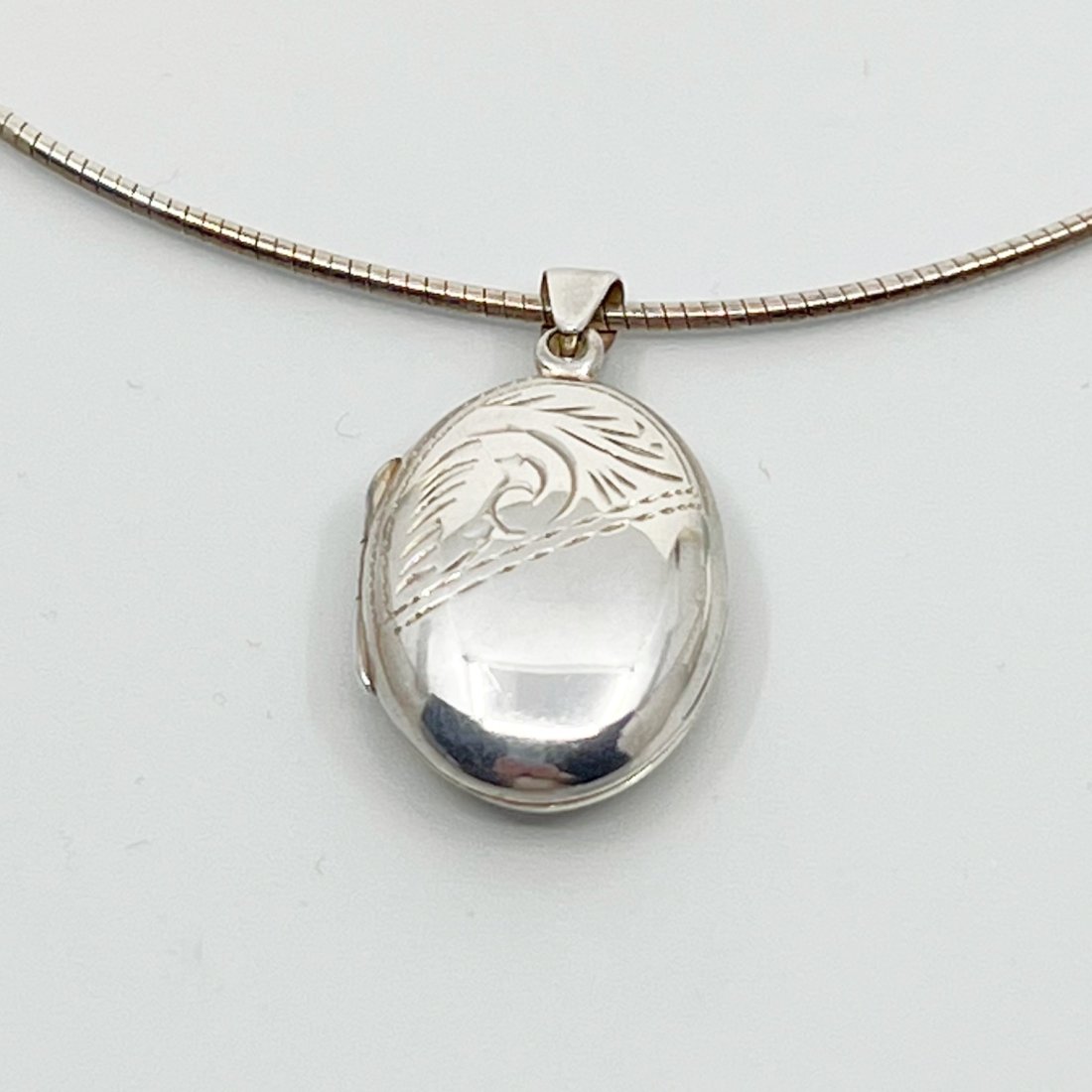 Sterling silver locket pendant SKU-277: Measures: 1 3/8" Long by 3/4" Wide Material: sterling silver Signed: 925 in very good condition SKU-277 <