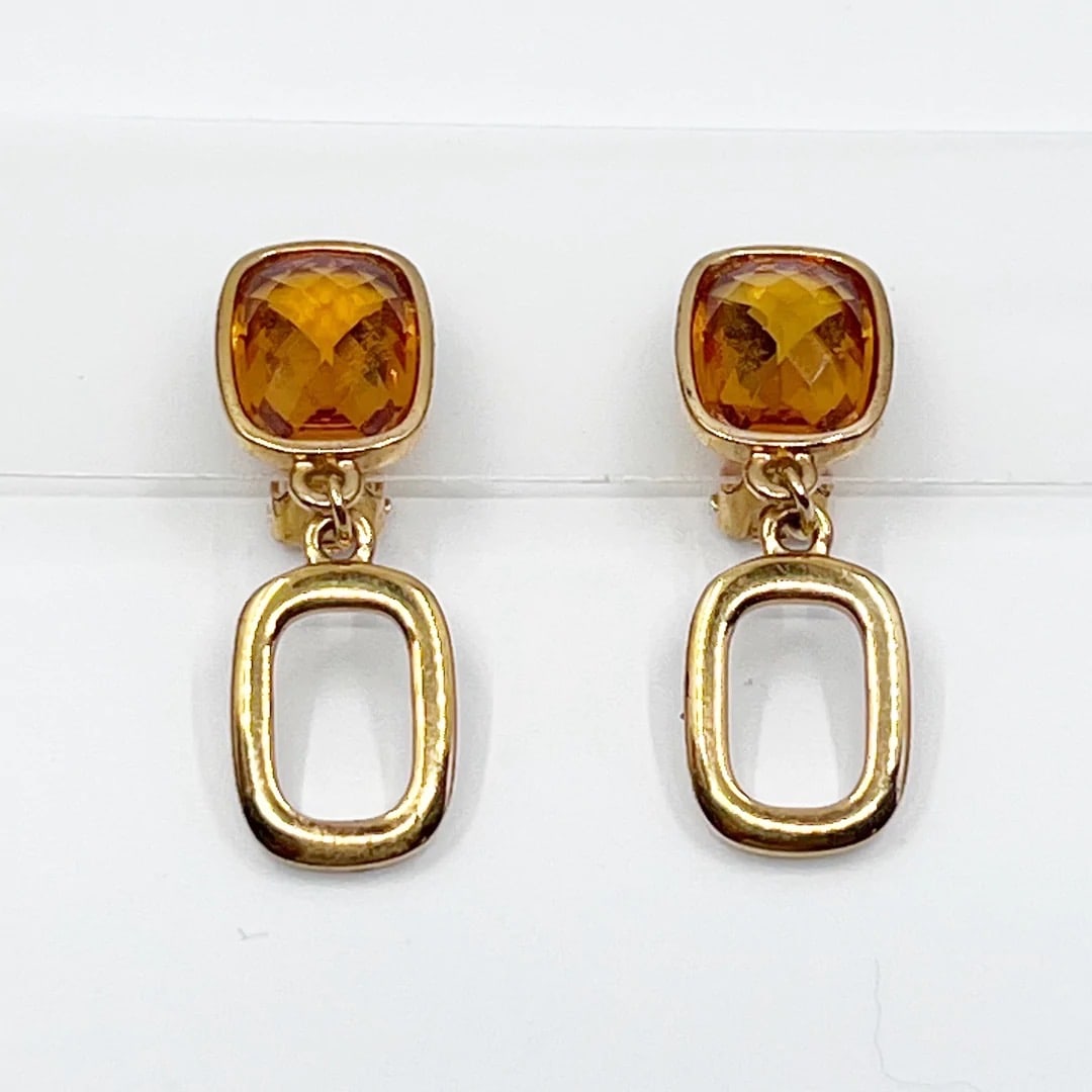 Swarovski crystal gold tone clip on earrings SKU-1679: Measurements: 1 1/2" long by 1/2” wide crafted with 14x10mm citrine Swarovski crystal signed: Swarovski Condition: like new SKU-1679