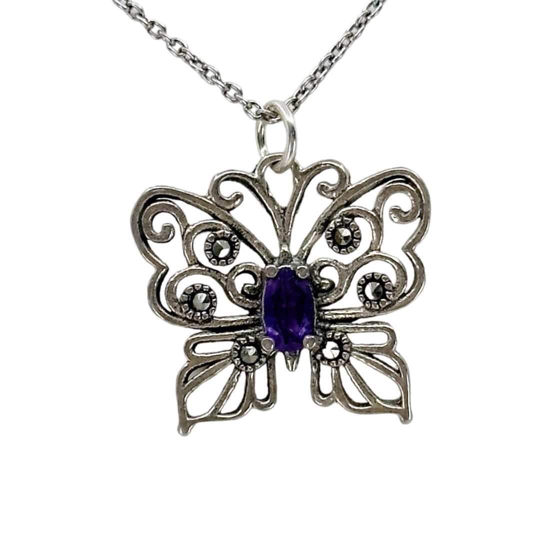 Sterling silver Amethyst & marcasite butterfly pendant SKU-958: measures: 3/4" long by 3/4" wide crafted with Amethyst & marcasite In very good condition