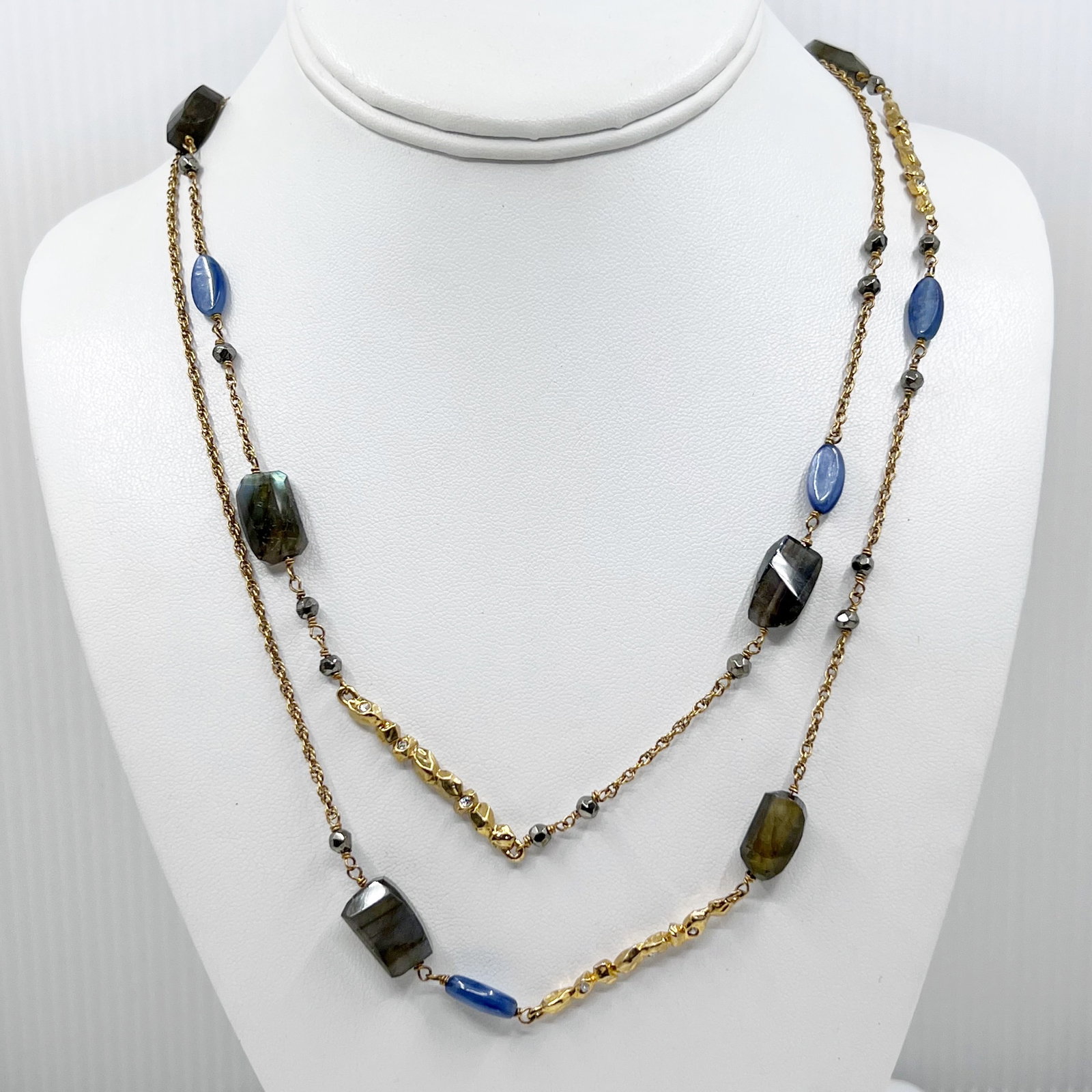 Alexis Bittar Labradorite Gold Tiered Rocky Station Crystals Necklace SKU-990: Measurements: 42" long crafted with labradorite, kunzite & crystals Signed: Alexis Bittar Condition: like new