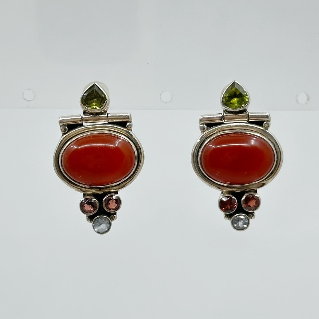 Sterling silver Carnelian & Gemstone earrings SKU-239: Measures: 1 1/8" long by 5/8" wide Crafted with carnelian, garnet, peridot & cubic zirconia Hallmark with 925 In very good condition SKU-230