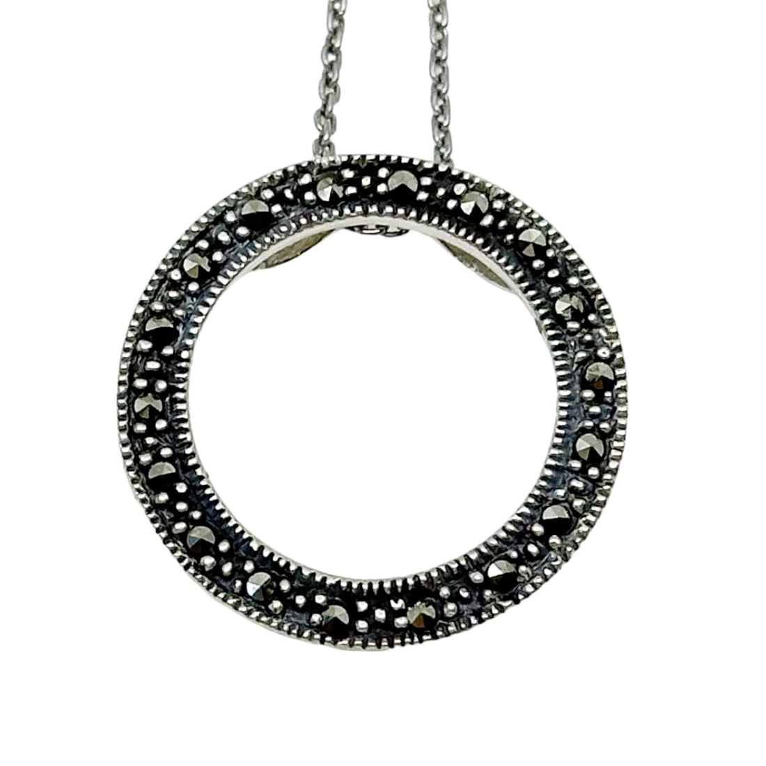 sterling silver marcasite circle pendant SKU-143: Measures: 3/4" in diameter crsafted with marcasite Hallmark: 925 In very good condition sku-143