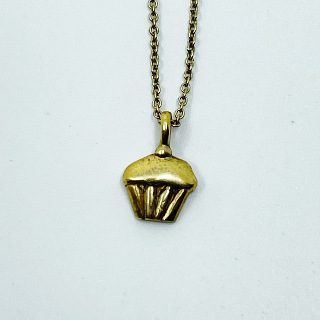 Gold vermeil sterling silver cup cake pendant necklace SKU-509: chain: 18" long pendant: 1/2” long by 5/16” wide condition: like ne SKU-509