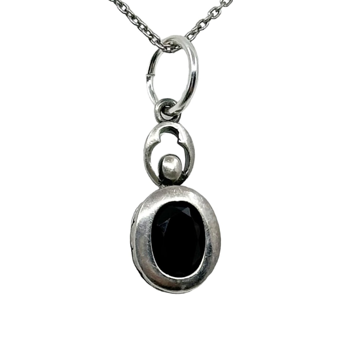 Sterling silver garnet pendant SKU-1159: Measures: 1" long by 3/8" wide crafted with garnet Hallmark: 925 In very good condition chain not included SKU-1159