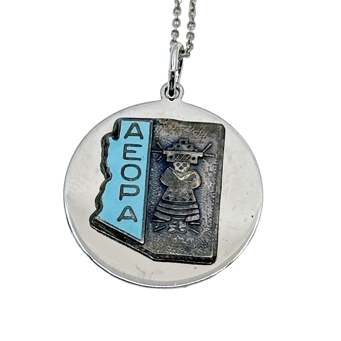 Vintage Sterling Silver AEOPA Arizona Educational Office Professionals Kachina Doll charm pendant: Measures: 1 1/4" long by 15/16" wide Hallmark: Elco Sterling In very good condition sku-17
