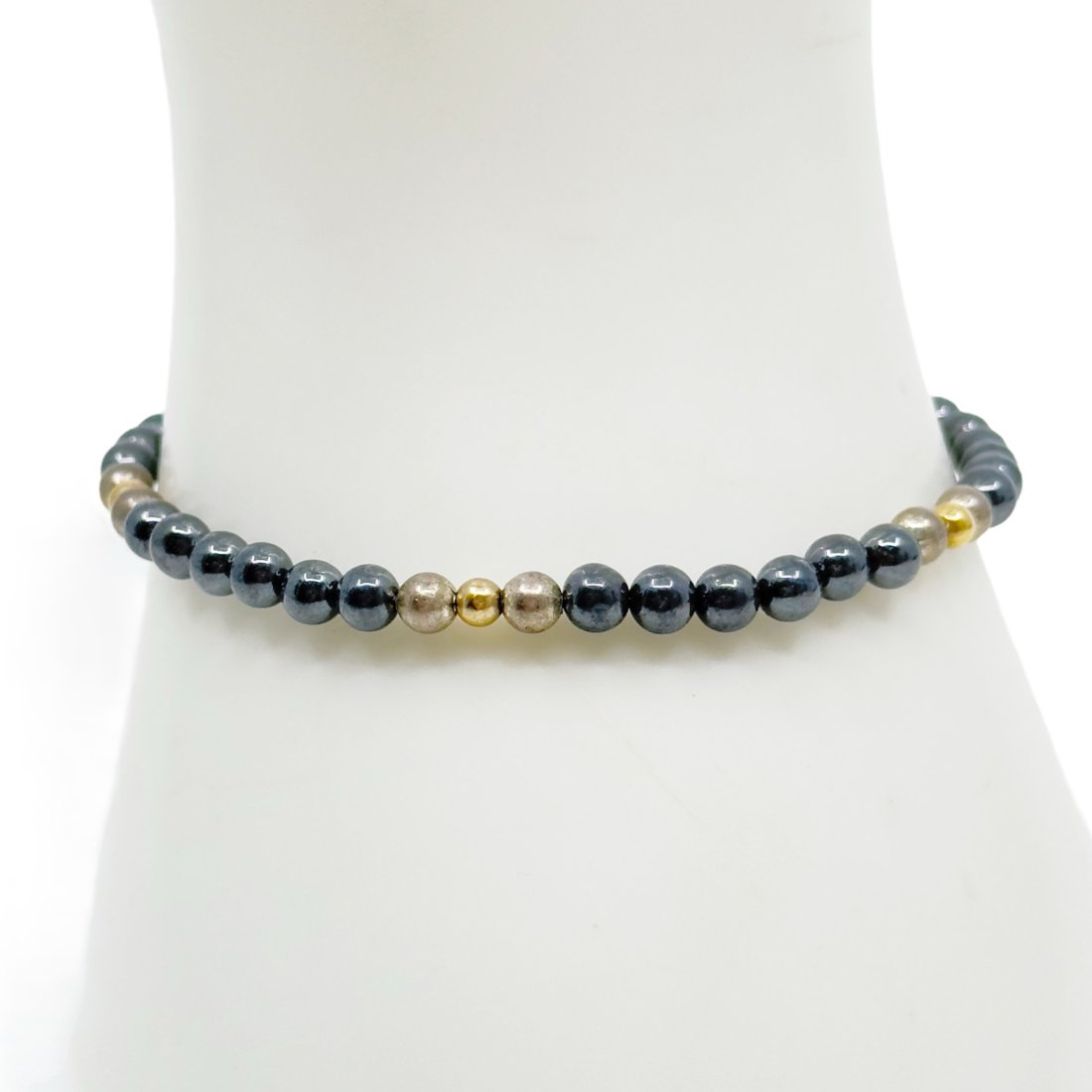 14k gold sterling silver hematite bead bracelet SKU-25: The bracelet will fit a 6 1/2" wrist Crafted with 2mm to 3mm 14k gold, sterling silver & Hematite beads Hallmark: 14k In very good condition SKU-25