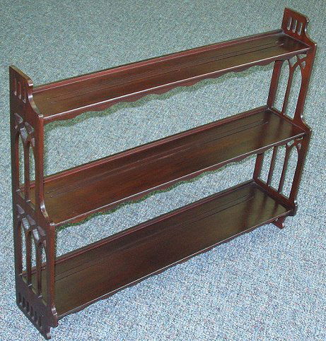 1940s Mahogany Wall Shelf w Plate Rails-Fretwork: Attractive wall shelf with double plate rails on each shelf. Excellent condition. 32" wide, 25.5" tall, x 7" deep.