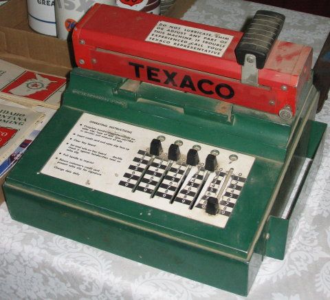 Old TEXACO Service Station Credit Card Machine: Great display item, 12" x 12" and 8" tall, 17.5 pounds. Shows light wear.