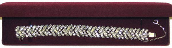 Fancy Vintage Joseph Mazer Rhinestone Bracelet: 6 3/4" wearable length, 5/8" wide. Some of the stones have slightly yellowed with age, none are grey or "dead". No missing stone, no damage. Interesting combination of two sized of round rhinestones p