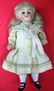 599: Antique Jointed Mini Bisque Doll & German Santa - 2