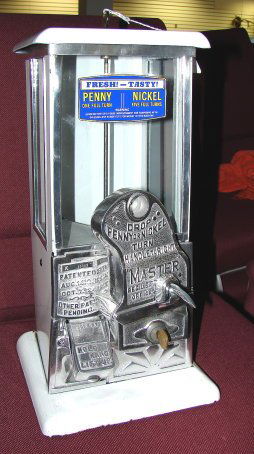 1923 Master Gumball/Peanut Machine Rare White: This original old penny or nickel master vending machine has a 1923-24 Patent date. The sticker on the front glass is new, the mechanism works properly. The keys are included (replacement keys.) It me