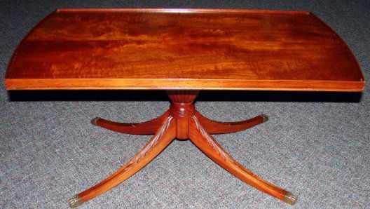 c1940's Duncan Phyfe Coffee Table: LOCAL PICK UP ONLY. This vintage Mersman coffee table measures 34" x 18 1/2" x 16 1/2" tall. One leg has been repaired and the repair is solid and looks good. The table is in otherwise beautiful condi