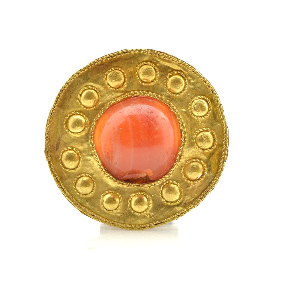 A Rare Parthian Gold and Carnelian Pectoral , ca. 1st - 3rd century CE: A Rare Parthian Gold and Carnelian Pectoral , ca. 1st - 3rd century CE, ca. 1st - 3rd century A.D.: Medium: Gold, Carnelian the pectoral of rounded form with large cabochon carnelian centrally set wit