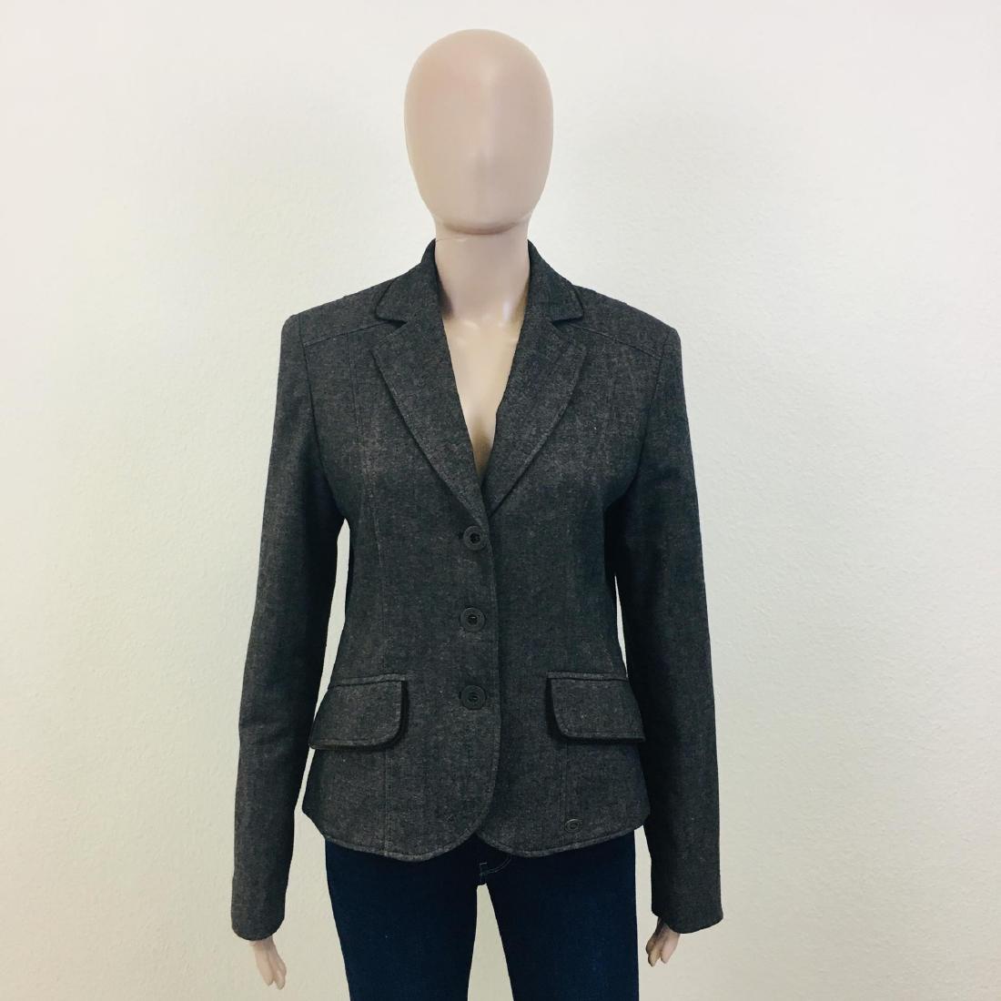 Women's Lisa Tossa Wool Blend Blazer Jacket: Size EUR 38 US 8 55% Polyester 27% Wool 14% Viscose 4% Elastane Armpit to Armpit: 18 in. Sleeve from shoulder seam: 24 in. Shoulder to shoulder: 15.5 in. Total length: 23 in.