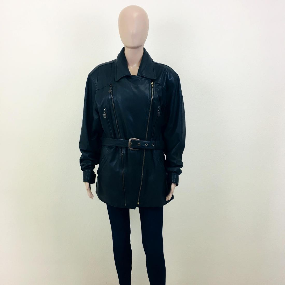 Vintage Women's Real Leather Coat Jacket: Size EUR 42 US 12 Inside removable fleece lining is missing 100% Leather Armpit to Armpit: 22 in. Sleeve from shoulder seam: 24 in. Shoulder to shoulder: 19 in. Total length: 31 in.