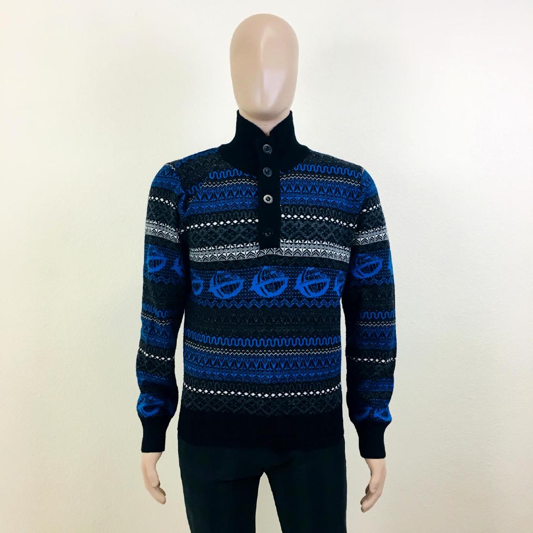 Vintage Men's Gnious Wool Blend Sweater: Size L 50% Acrylic 50% Wool Armpit to Armpit: 20.5 in. Sleeve from shoulder seam: 26 in. Shoulder to shoulder: 17 in. Total length: 24 in.