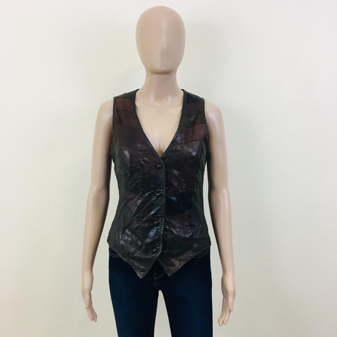 Vintage Women's PENTIK Finnish Leather Waistcoat: Size EUR 38 US 8 Armpit to Armpit: 17 in. Total length: 19 in.