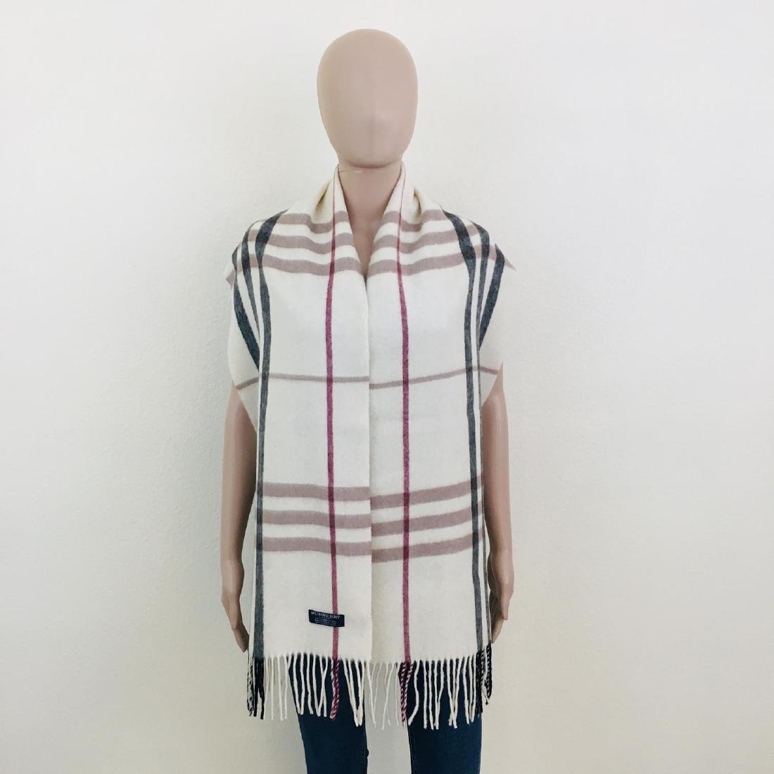 Burberry 100% Lambswool Scarf: 100% Lambswool Color: Ivory Measurements: 74 x 12 in.