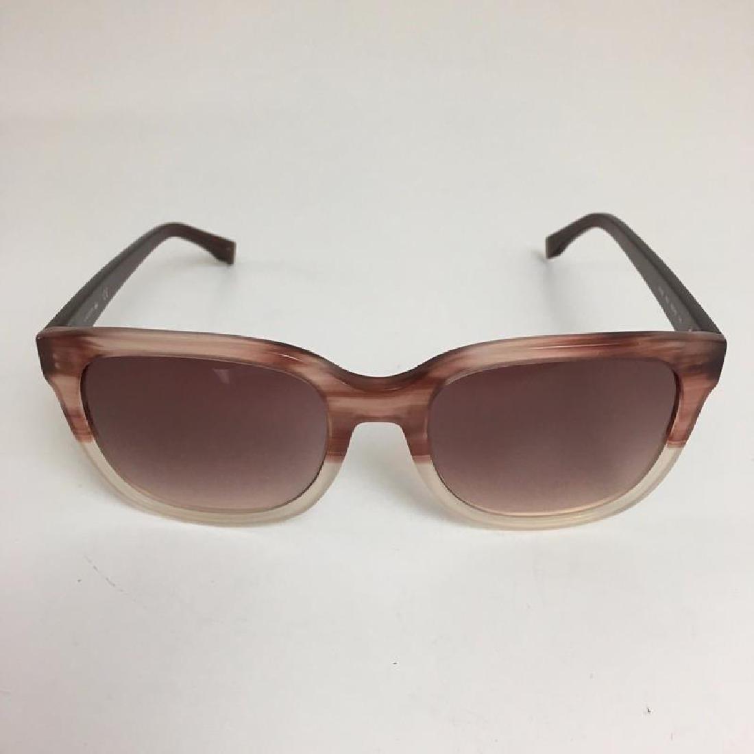 Lacoste Ladies Sunglasses: Temples length: 140 mm Lenses diameter: 55 mm Bridge width: 19 mm Frame: acetate Color - Light Brown Frame: acetate Temples length: 140 mm Lenses diameter: 55 mm Bridge width: 19 mm UV protection Orig