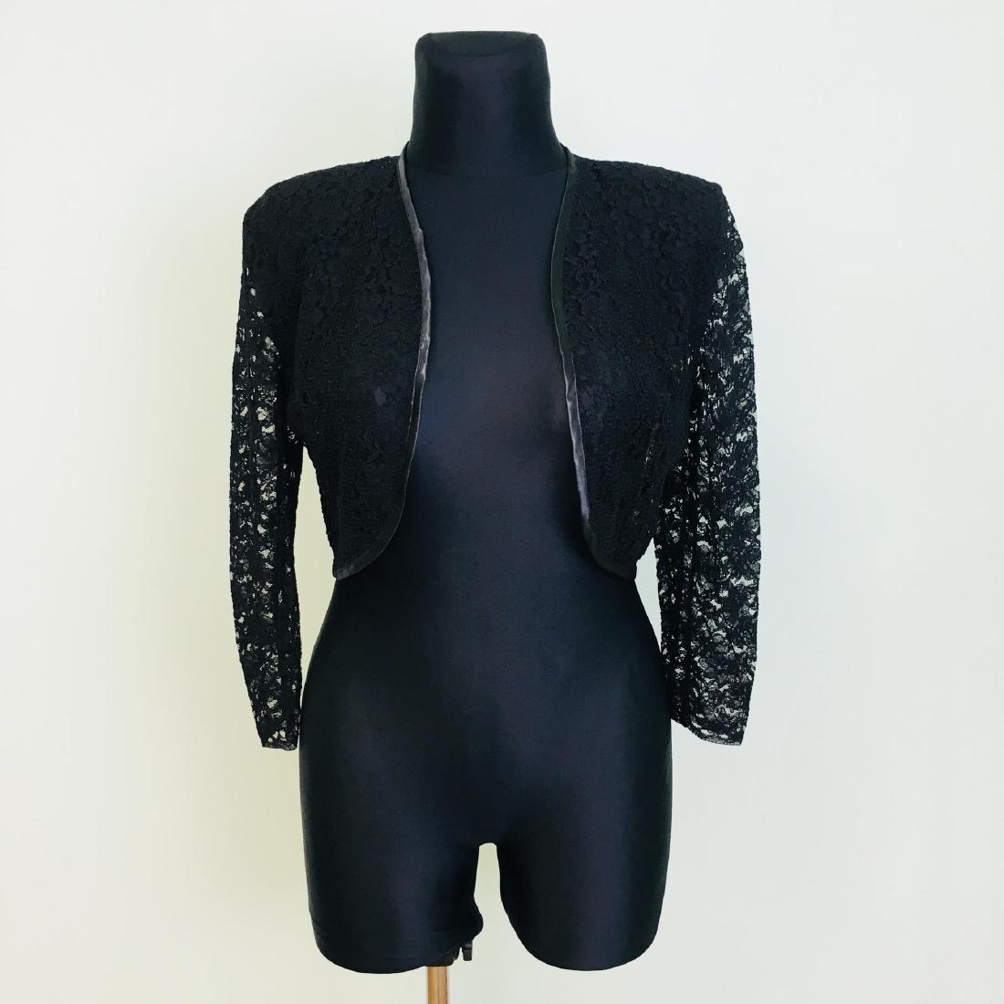 Vintage Women's Black Cardigan Jacket Sweater: Size EUR 42 US 12 Armpit to Armpit: 19.5 in. Sleeve from shoulder seam: 20 in. Total length: 16 in.