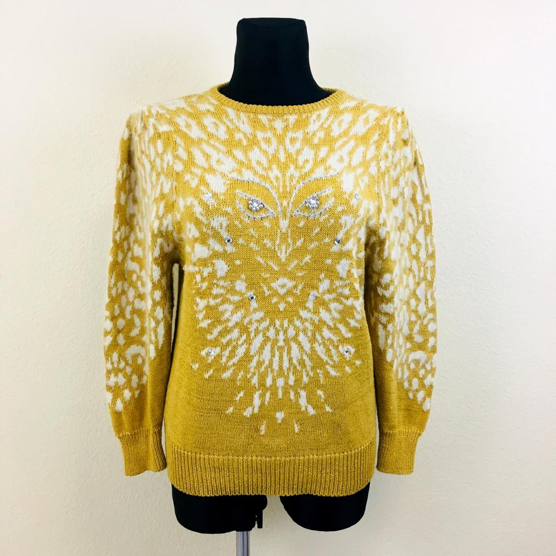 Vintage Women's Exclusive Fashion Sweater: Size EUR 42 US 12 58% Cotton 32% Acrylic 7% Angora 3% Nylon Armpit to Armpit: 20.5 in. Sleeve from shoulder seam: 24 in. Total length: 26 in.