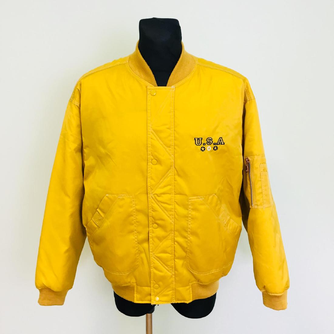 Vintage Men's Earthbound USA Bomber Padded Jacket: Size XL Vintage 100% Nylon Armpit to Armpit: 27 in. Sleeve from shoulder seam: 24 in. Total length: 28 in.