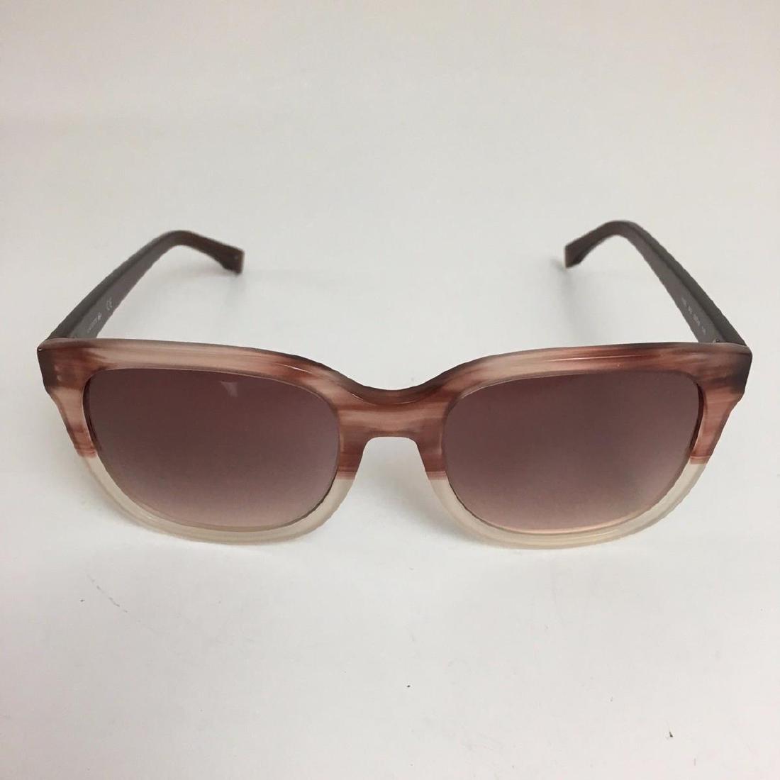 Lacoste Ladies Sunglasses: Temples length: 140 mm Lenses diameter: 55 mm Bridge width: 19 mm Frame: acetate Color - Light Brown Frame: acetate Temples length: 140 mm Lenses diameter: 55 mm Bridge width: 19 mm UV protection Orig