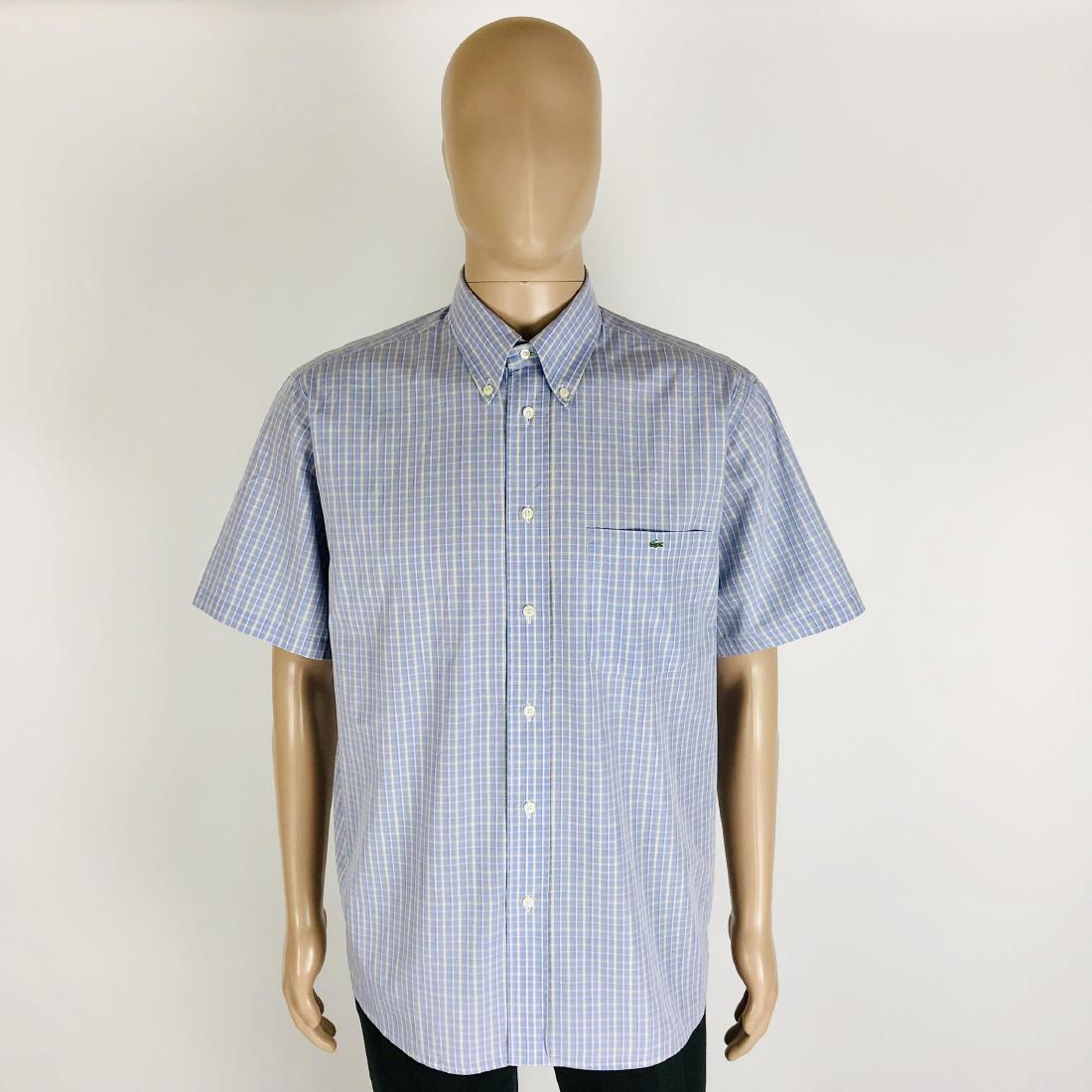 Men's Lacoste Shirt Size 41: Size 41 100% Cotton Armpit to Armpit: 25.5 in. Shoulder to shoulder: 19.5 in. Total length: 31.5 in.